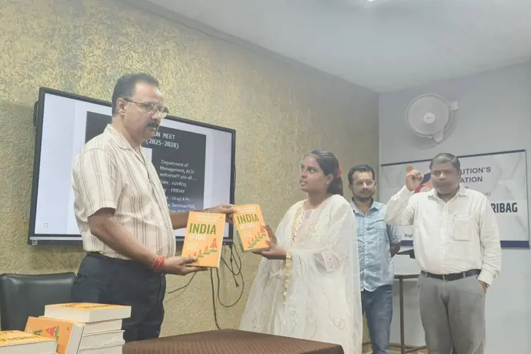 BOOK DISTRIBUTIONS TO BBA STUDENTS BY OUR PRINICIPAL Dr.Nilmani Mukherjee