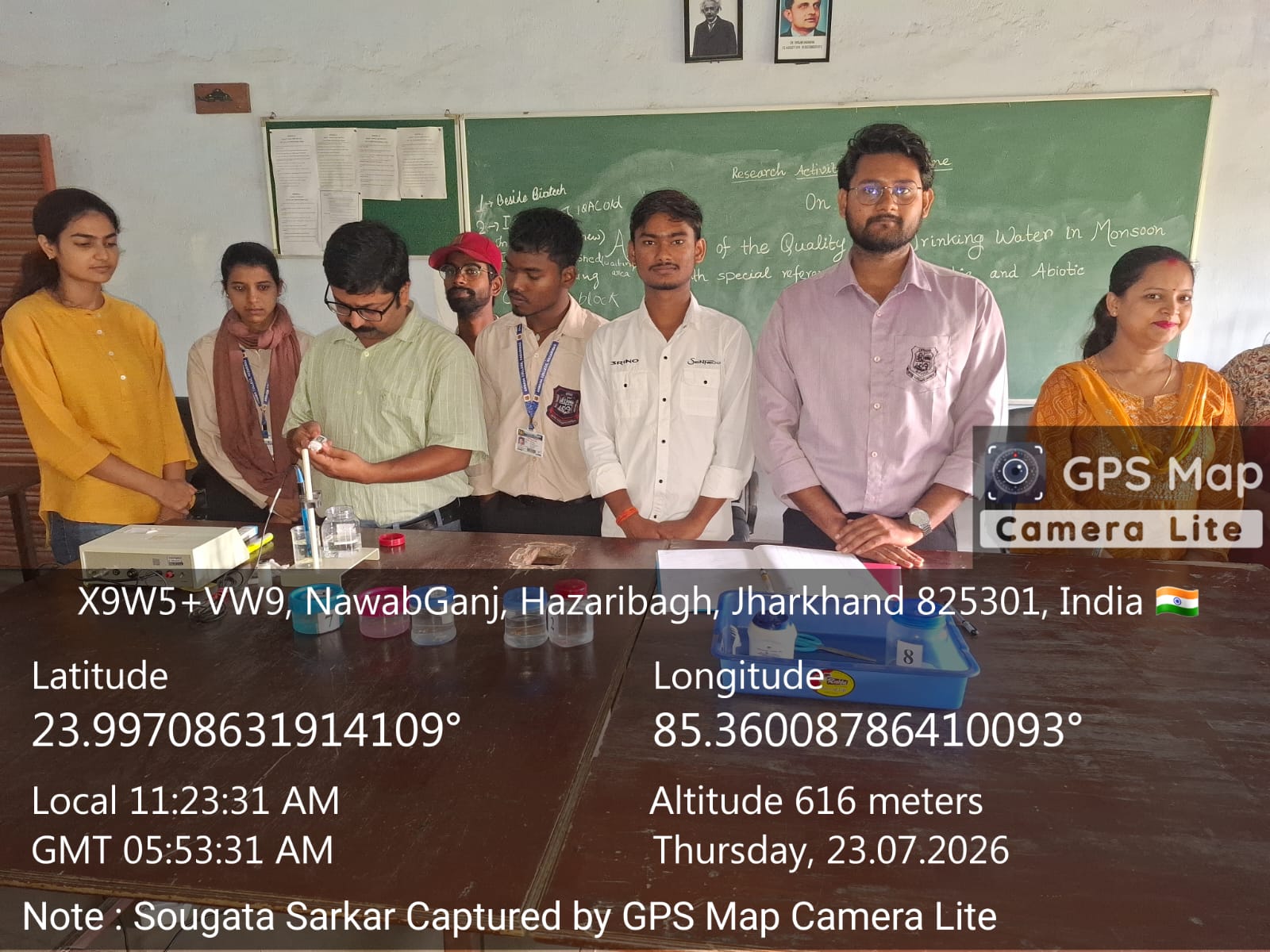 pH test of collected water samples by group of students.